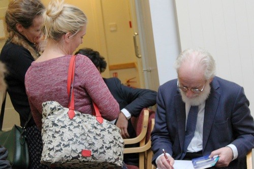 Professor David Crystal signs one of his books